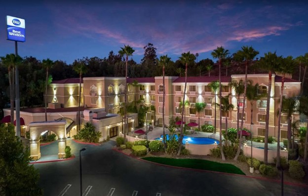 Exterior evening view of the Best Western Escondido Hotel in Escondido, California.