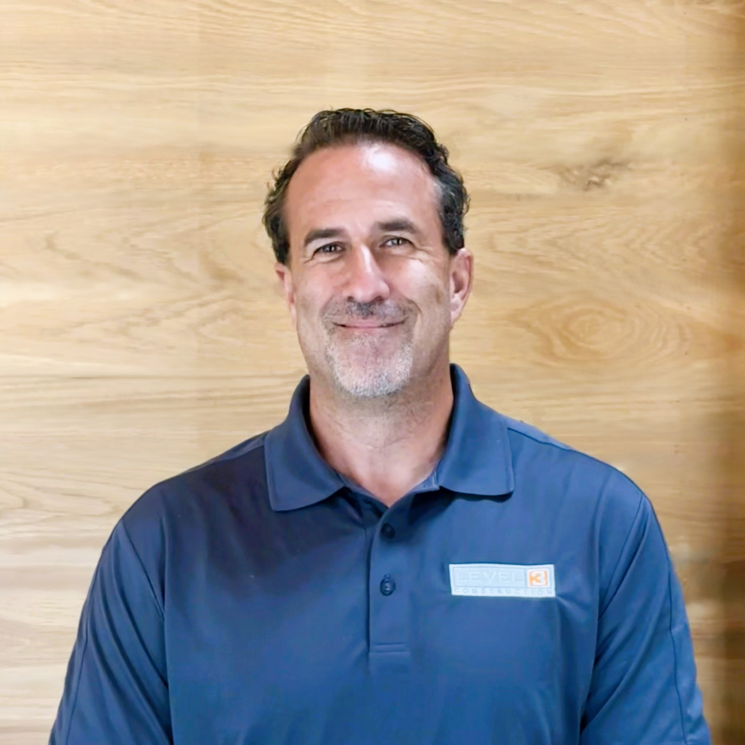 Portrait of Nick Byrd, director of Pre-construction at Level 3 Construction, who leads the company's pre-construction services for multifamily, hospitality, mixed-use, and commercial projects.